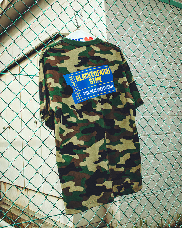 RENTAL TICKET LOGO TEE WOODLAND CAMO