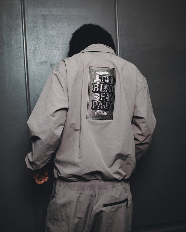 SMALL HWC NYLON TRACK JACKET GRAY